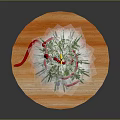 Decorated Christmas Tree On Wooden Circular Base With Red Ribbon Wrapped Around Branches