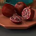 Elegant Dinnerware Set on Wooden Table with Green Placemats Wine Glasses Candles and Pomegranates
