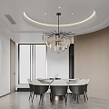 Modern Living and Dining Room Interior With Gray Sofa Round Coffee Tables And Abstract Artwork