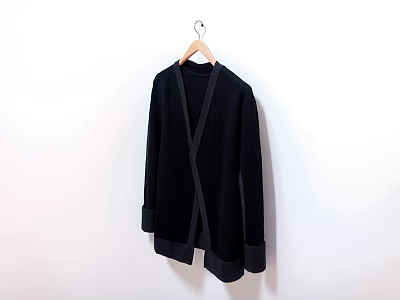 Black Open Front Knitted Cardigan Hanging On Wooden Hanger Against White Wall 3d model