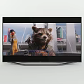 Modern Slim Black TV Showing Large Stone Statues Mountain River Scene
