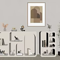 Modern Minimalist Beige Decorative Cabinets With Open Shelves Books Ornaments Green Plants And Wall Art