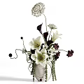 Elegant White Vase With Mixed White And Dark Flowers And Vine Decorations