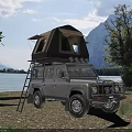 Scenic Mountain Lake View With Off Road Vehicle And Roof Tent On Green Meadow