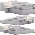 Modern Bed Design with Upholstered Frame White Pillows Gray Blanket and Sleek Nightstand