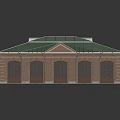 Traditional Building With Green Sloped Roofs And Red Brick Walls