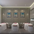 Elegant SPA Interior Design With Three Treatment Beds Pink Towels Framed Artworks And Gray Walls