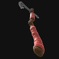 Decorative Medieval Axe With Ornate Metal Head And Red Wrapped Wooden Handle