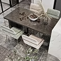 Modern Minimalist Living Dining Room Interior With Gray Sofa Dark Pillows And Green Plant