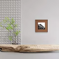 Ornamental Decor Combination With Green Plant Framed Painting And Wooden Log On Grid Wall