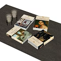 Art Themed Hardcover Books With Painting Covers On Wooden Table And Decorative Candles