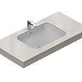 Modern Minimalist Bathroom Washbasin With Light Colored Countertop And Silver Faucet