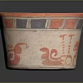 Traditional Ancient Pottery Sculpture With Red Orange Decorations And Intricate Colorful Patterns