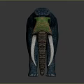 Blue And Green Mammoth Sculpture With Long White Tusks And Detailed Texture
