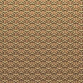 Modern Building Exterior Wall Featuring Repeating Geometric Pattern and Brown Gold Texture