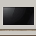 Black Television Mounted on Wall with Wooden Shelf and Golden Cylindrical Speakers on Both Ends