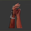 Red Hand Model Displaying Stylish Wrist Accessory With Geometric Patterns And Black Gemstones
