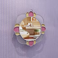 Round Mirror with Pink and Gold Decorations Reflecting Bedroom with Bed and Nightstand