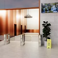 Public Facility Lobby With Copper Entrance White Marble Walls Floor Metal Railings And Green Plants