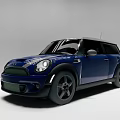 Blue MINI Car with Sporty Front Grille and Black Wheels Modern Compact Design