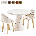 Lovely Cream White Round Dining Table With Patterned Upholstered Chairs Set For Cozy Kids Room