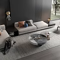 Modern Living Room Sofa Coffee Table Set With Gray Sofa Pillows And Black Wall