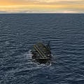 Sunset Over Ocean With Large Ship Sailing On Calm Blue Water