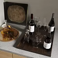 Elegant Red Wine Bottles And Wine Glasses On Wooden Tray With Countertop Arrangement