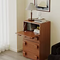 Modern Wooden Dresser With Open Drawer Table Lamp Books And Bust Statue