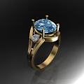 Elegant Gold Ring With Sparkling Blue Center Gemstone And Small Diamonds