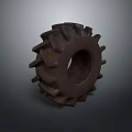 Heavy Duty Black Tire With Deep Tread Blocks On Gray Background