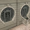 Elegant Swing Door With Circular Wrought Iron Grille On Stone Wall Steps And Potted Plants