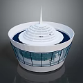 Modern Circular Architectural Structure With White Spire Blue Base And Glass Windows