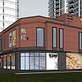 Red Brick Commercial Building With Glass Windows And Outdoor Umbrellas Near Tall Buildings