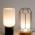 Illuminated Modern Table Lamps With White Cylindrical Shade And Geometric Metal Frame