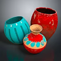 Three Decorative Ceramic Vases With Blue Red Patterns And Unique Designs