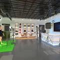 Mall Store Exhibition Hall Featuring Multi-Treasure Cabinets Photography Lights Green Carpet And Woman Walking