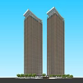 Two Modern Skyscrapers With Glass Facades Against Blue Sky And Greenery