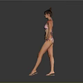 Confident Woman In Floral Bikini Standing With Hands On Hips Against Gray Background
