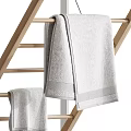 Wooden Clothes Drying Rack With Gray Towels For Household Laundry Daily Use