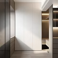 Modern Walk in Closet With White Cabinets And Warm Lighting