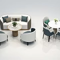 Modern Sofa and Coffee Table Set With White Gray Upholstery Decorative Pillows and Green Plant