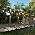 Outdoor Bicycle Shelter With Metal Frame For Bike Parking Surrounded By Green Trees And Grass