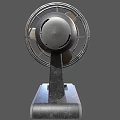 Vintage Electric Fan With Metal Circular Mesh Guard And Control Buttons On Base