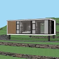 Modern Guesthouse Building With Large Glass Windows And Natural Green Surroundings