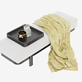 Modern White Footstool With Black Tray Decorative Items And Yellow Blanket On Black Legs