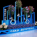 Blue Frame Photo Check In Spot With HEALTH Sign And Colorful Floral Decorations