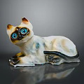 Siamese Cat With Blue Eyes And White Brown Fur Lying Ceramic Figurine On Dark Surface