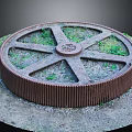 Large Rusty Industrial Metal Gear Hardware Tool in Outdoor Grass Field
