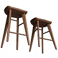 Two Brown Wooden Stools With Modern Design And Natural Wood Finish